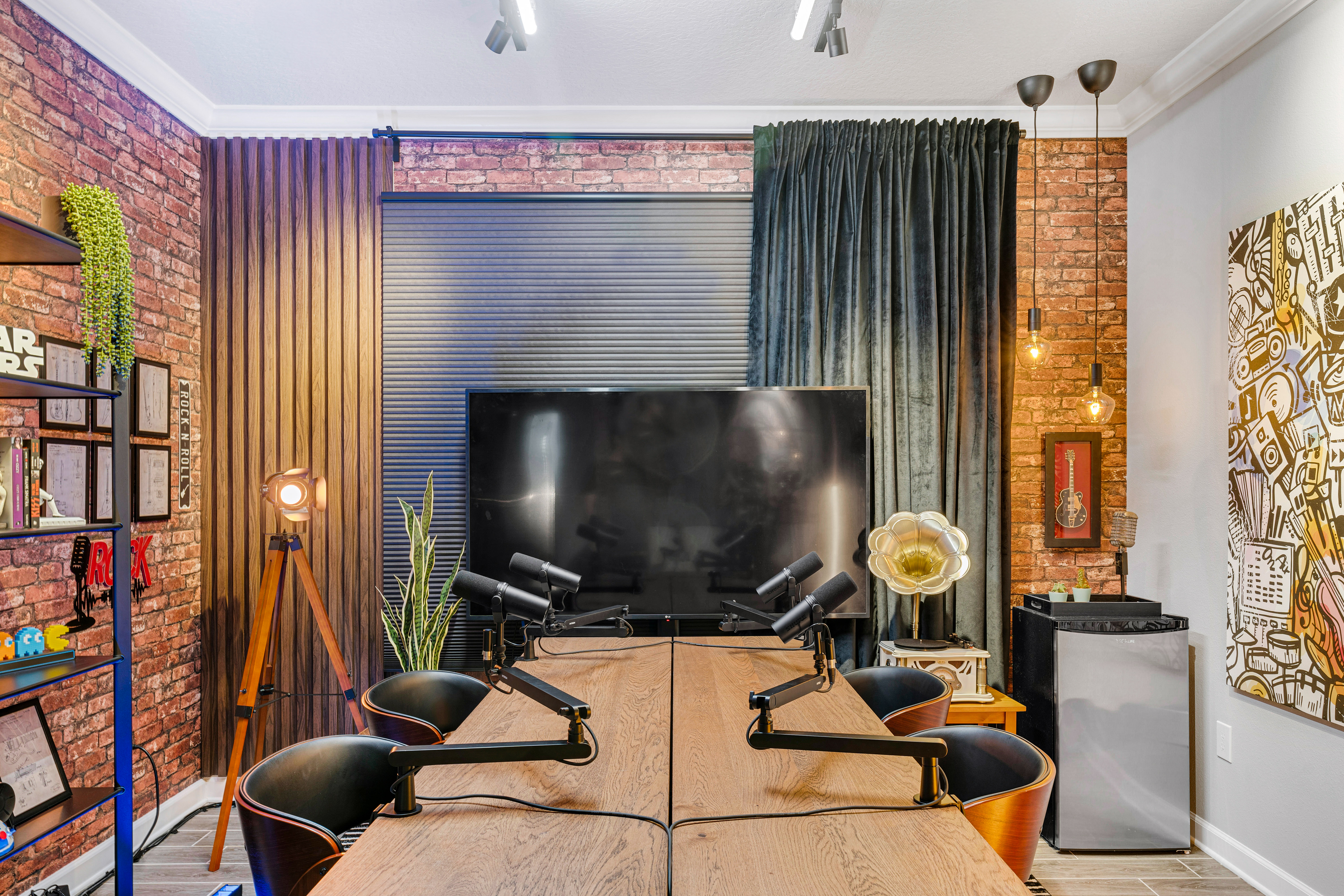 Podcast studio with table and microphones