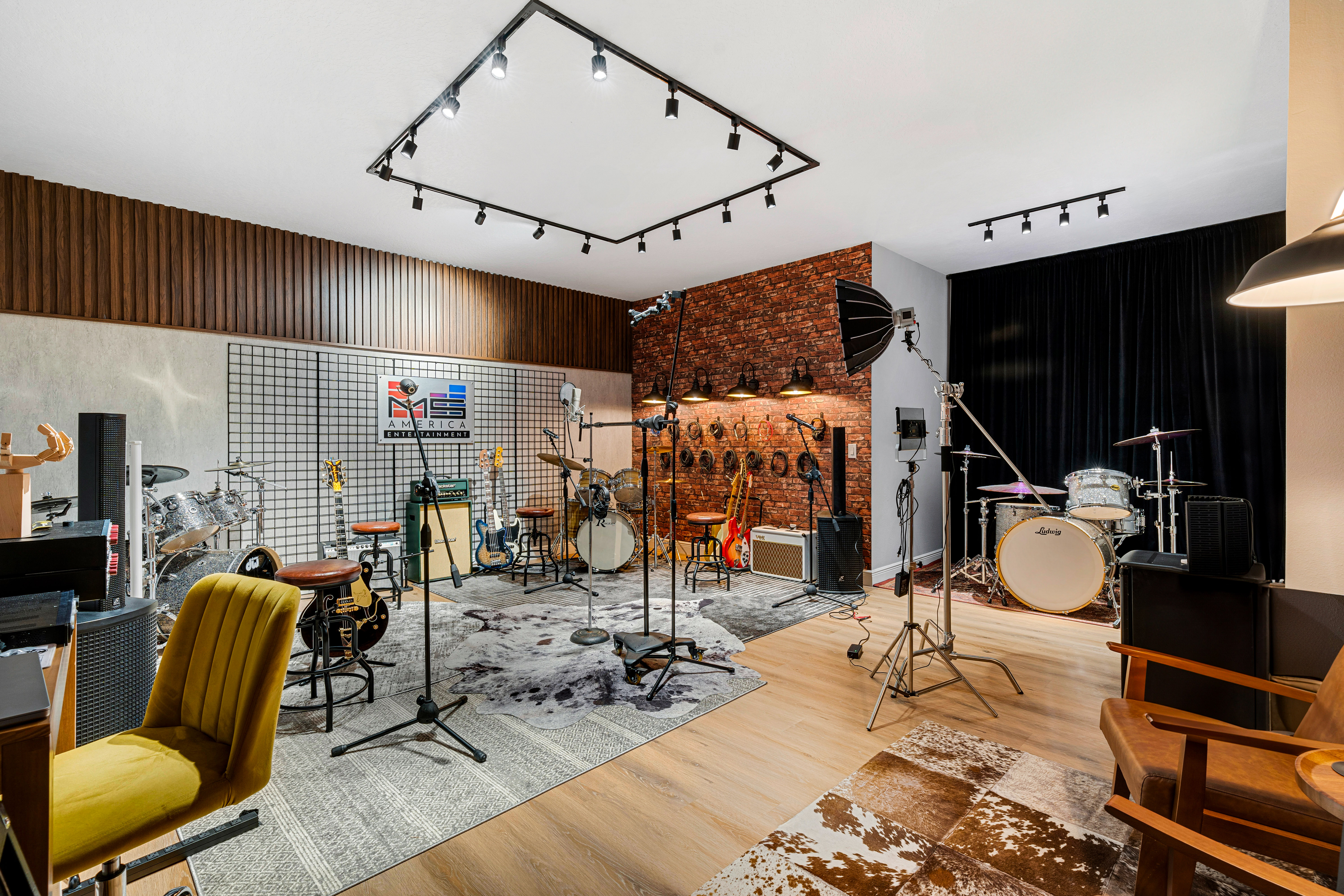 Wide view of the studio with musical instruments and equipment
