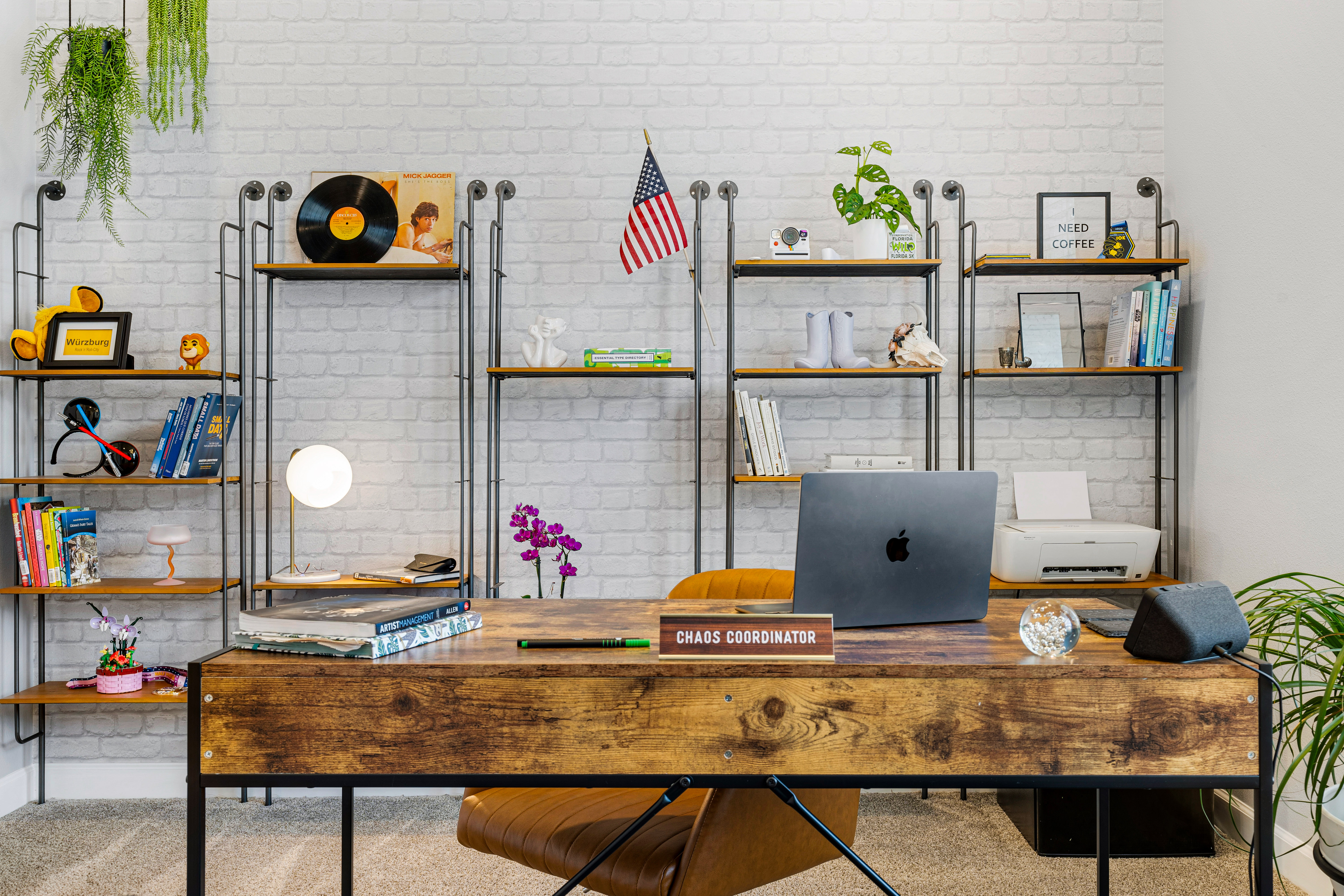 Office with wooden desk and shelving